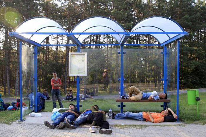 Migrants in Hungary seek traffickers on trip "from death to death"