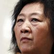 Chinese court upholds conviction against journalist but lowers sentence by 2 years