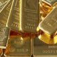 Gold hovers near 3-week high as equities slip