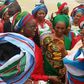 Wife of the President, Aisha Buhari (middle), wife of the Vice President, Dolapo Osinbajo (left) surrounded by women in Gombe state as the First Lady donated funds to bomb blast victims in the state.