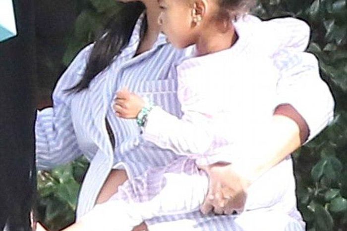 Kim Kardashian flashes swollen belly at pyjamas-theme baby shower in California