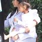 Kim Kardashian flashes swollen belly at pyjamas-theme baby shower in California