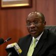 Governor Godwin Emefiele announces that Nigeria's central bank is keeping its benchmark interest rate on hold at 13 percent in Abuja, Nigeria, July 24, 2015. REUTERS/Afolabi Sotunde