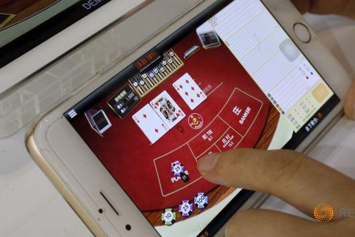China arrests 98 in crackdown on online gambling rings
