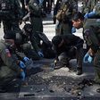 Thai police issue 2 new arrest warrants after raid finds bomb-making materials