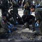 Thai police issue 2 new arrest warrants after raid finds bomb-making materials