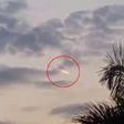 This family were stunned when they saw an alien flying in the skies above their home.