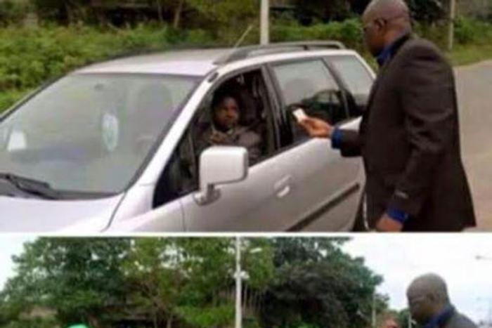 Governor Ayo Fayose spotted in suit on the streets checking motorists drivers license