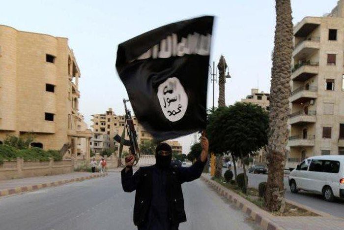 Islamic State attacks Syrian air base in east, dozens reported killed