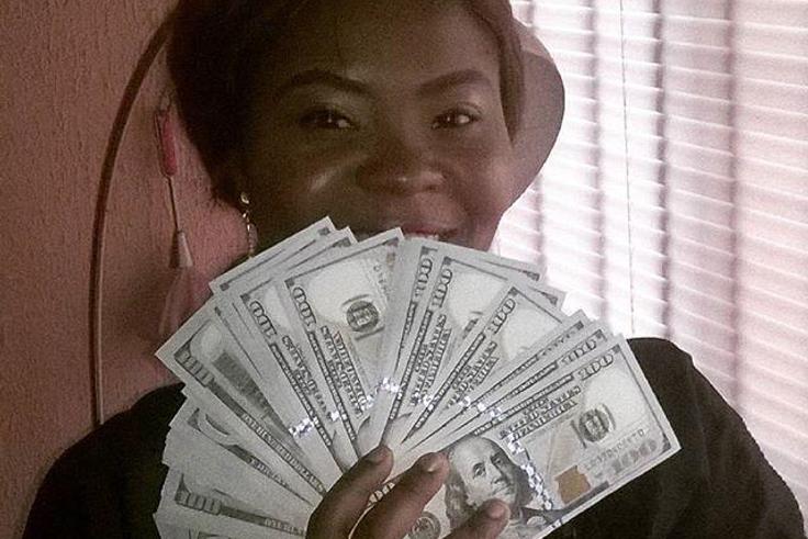 Kehinde Olorunyomi flaunts dollar bills on Instagram