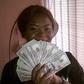 Kehinde Olorunyomi flaunts dollar bills on Instagram