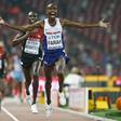 Mo Farah of Britain reacts after winning the men's 10000m event during the 15th IAAF World Championships at the National Stadium in Beijing, China August 22, 2015.     REUTERS/Lucy Nicholson
