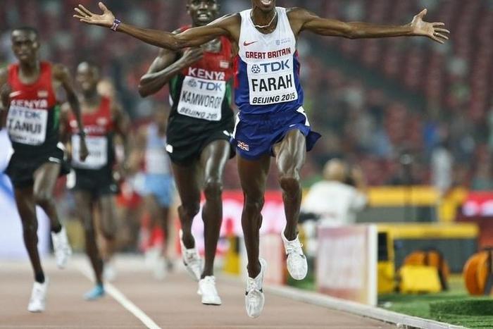 Mo Farah of Britain reacts after winning the men's 10000m event during the 15th IAAF World Championships at the National Stadium in Beijing, China August 22, 2015.     REUTERS/Lucy Nicholson