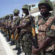 African Union peacekeeping soldiers from Uganda parade during the arrival of Somalia's new president and former leader of the opposition Alliance for the Re-Liberation of Somalia Sheikh Sharif Ahmed in the capital Mogadishu February 7, 2009. REUTERS/Fe...