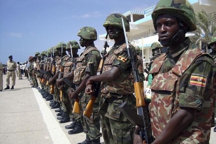 African Union peacekeeping soldiers from Uganda parade during the arrival of Somalia's new president and former leader of the opposition Alliance for the Re-Liberation of Somalia Sheikh Sharif Ahmed in the capital Mogadishu February 7, 2009. REUTERS/Fe...