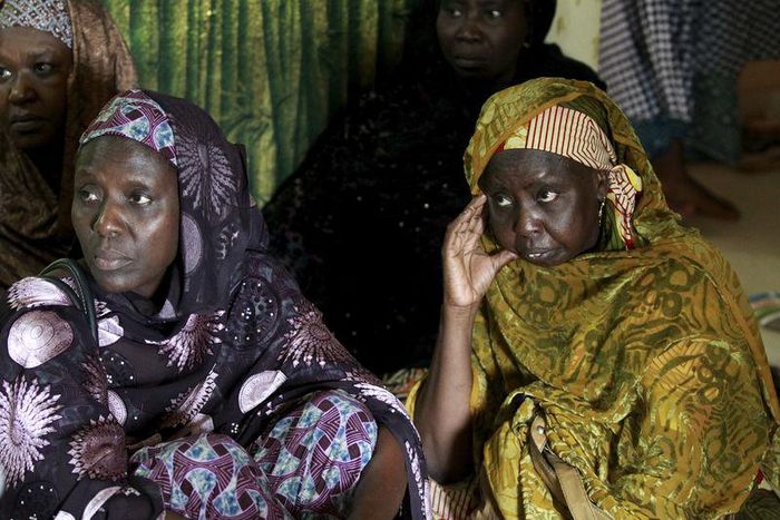 Mourners look on as they pay their respects during a visit to the family of Bilikisu Yusuf, one of the victims of the stampede which occurred in Saudi Arabia's Mina, in Kaduna, Nigeria September 26, 2015. REUTERS/Afolabi Sotunde