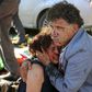 An injured man hugs an injured woman after an explosion during a peace march in Ankara, Turkey, October 10, 2015. REUTERS/Tumay Berkin