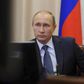 Russian President Vladimir Putin attends a video conference with Russia"s personnel engaged in Syria military operation, at the Novo-Ogaryovo state residence outside Moscow, Russia November 20, 2015.