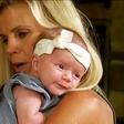 Sherri Dickson, a 51-year-old mother in America gives birth to her own granddaughter after serving as a surrogate for her daughter.