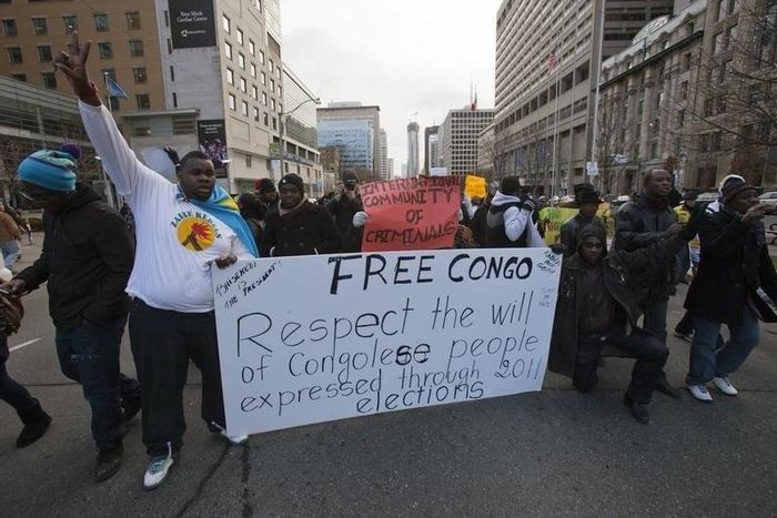 Protesters march up a downtown street during protest against a past presidential election in the Democratic Republic of the Congo, in a file photo.  REUTERS/Mark Blinch