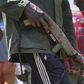 An anti-Balaka soldier holds a handmade gun as former child soldiers wait to be released in Bambari, Central African Republic, May 14, 2015. REUTERS/Emmanuel Braun
