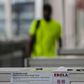 Health warnings about the Ebola virus are displayed at the entrance of the Canton Fair in Guangzhou, Guangdong province, October 26, 2014. REUTERS/Alex Lee