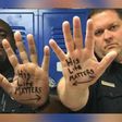 The Trinity Police Department shared a powerful photo of Chief Steven Jones and Officer Donald Givens, who are two different races, with "His Life Matters" written on the palm of their hands, each with an arrow pointed to the other.