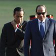 Egyptian President Abdel Fattah Al-Sisi (C) walks with his counterpart from Indonesia, President Joko Widodo, after inspecting a honor guard at the Presidential Palace in Jakarta September 4, 2015. REUTERS/Beawiharta