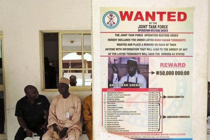 A poster advertising for the search of Boko Haram leader Abubakar Shekau is pasted on a wall in Baga village on the outskirts of Maiduguri, in the north-eastern state of Borno May 13, 2013. REUTERS/Tim Cocks