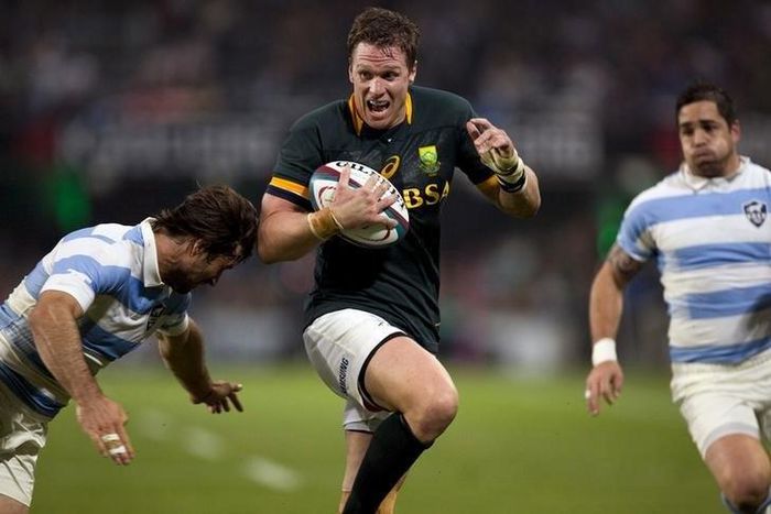 South Africa's Jean de Villiers attempts to avoid the tackle by Argentina's Marcelo Bosch (L) during their Championship rugby union test match in Durban, August 8 2015. REUTERS/Rogan Ward