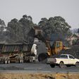Coal is loaded onto a truck at the Woestalleen colliery near Middleburg in Mpumalanga province, September 8, 2015. REUTERS/Siphiwe Sibeko