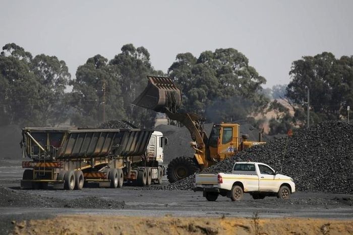 Coal is loaded onto a truck at the Woestalleen colliery near Middleburg in Mpumalanga province, September 8, 2015. REUTERS/Siphiwe Sibeko