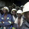 Konkola Copper Mines PLC workers wait in a lift before going to work underground in Konkola, in this file photo. DAVOS/AFRICA REUTERS/Stringer