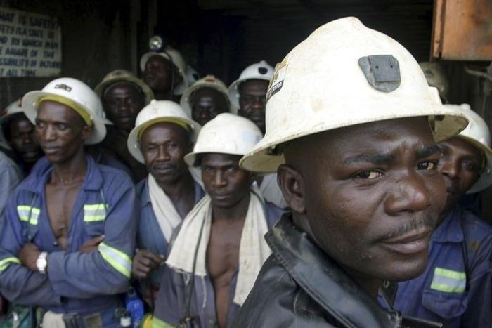 Konkola Copper Mines PLC workers wait in a lift before going to work underground in Konkola, in this file photo. DAVOS/AFRICA REUTERS/Stringer