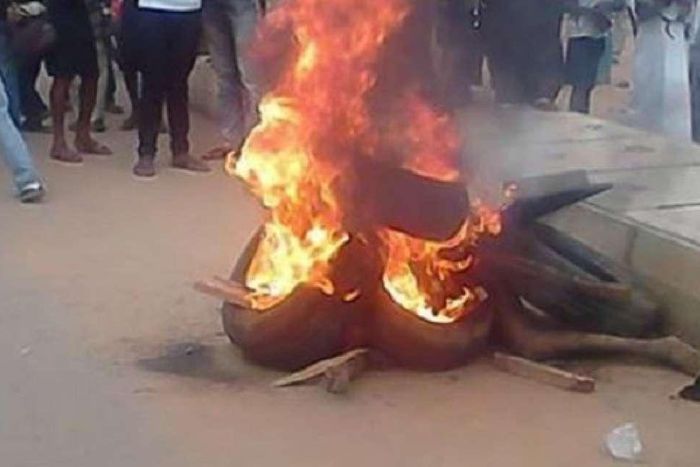 Angry mob burn man accused of stabbing neighbour to death