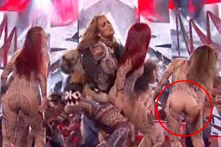 Jennifer Lopez's dancer catsuit split at butt section during 2015 AMA performance in Los Angeles