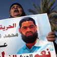 Palestinian hunger striker loses consciousness in Israeli hospital