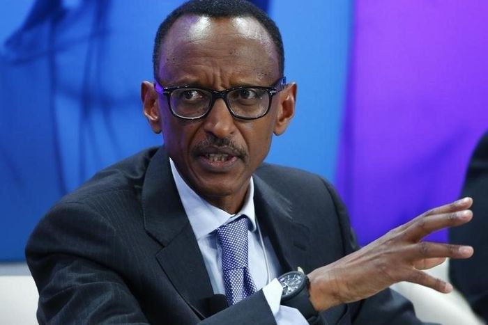 Rwanda President Paul Kagame gestures during the session 'Ending Poverty through Parity' in the Swiss mountain resort of Davos January 24, 2015. REUTERS/Ruben Sprich