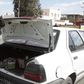 A police officer checks the back of a car at a checkpoint near the police headquarters in western Kasserine region October 23, 2014, as part of security measures ahead of the country's parliamentary elections on Sunday. REUTERS/Zoubeir Souissi