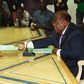 Charles Konan Banny, independent candidate for the 2015 presidential election, submits documents to Ivorian Independent Electoral Commission (CEI) president Youssouf Bakayoko to register his candidacy for the presidential election in Abidjan, Ivory Coa...