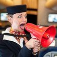___4344221___https:______static.pulse.com.gh___webservice___escenic___binary___4344221___2015___11___10___14___art-flight-attendant-angry-megaphone-620x349