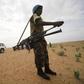 UNAMID peacekeepers stand guard as a delegation of Ambassadors of European Union to Sudan visits a women development program centre funded by World Food Programme (WFP) at Shagra village in North Darfur October 18, 2012. REUTERS/Mohamed Nureldin Abdall...