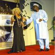 Cossy Ojiakor receiving an award in Germany
