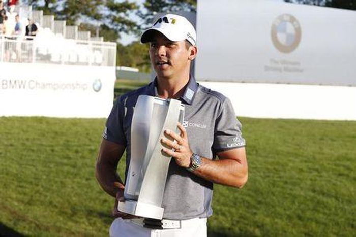 Day wins BMW, becomes world number one