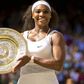 Serena Willaims holding one of her numerous trophies
