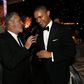 Television personality Jon Stewart (L) talks with actor Trevor Noah at the 67th Annual Primetime Emmy Awards Governors Ball in Los Angeles, California September 20, 2015. REUTERS/Mario Anzuoni
