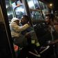 Migrants enter a bus, which is supposed to leave to Austria and Germany, at the Keleti trainstation in Budapest, Hungary, September 4, 2015. REUTERS/Bernadett Szabo