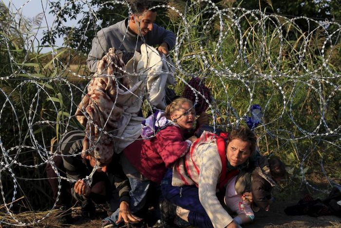 Italy police detain 10 suspected people traffickers in murder probe