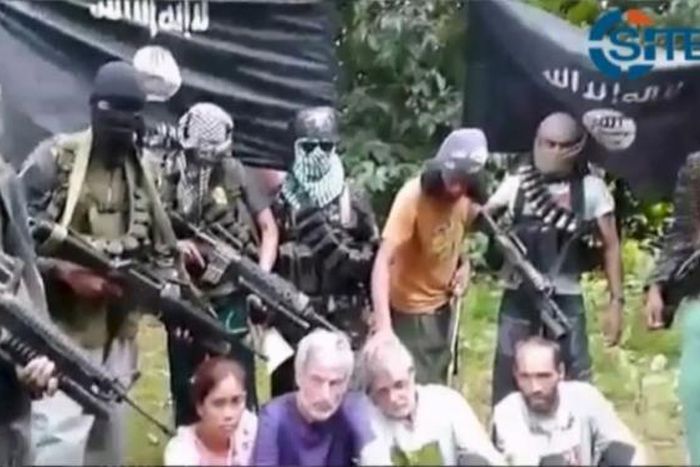 Hostages appeal in video for halt to Philippine military operations