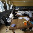 Election officials examine votes at a results centralization center at Ratoma two days after a presidential election in Conakry, Guinea October 14, 2015. REUTERS/Luc Gnago